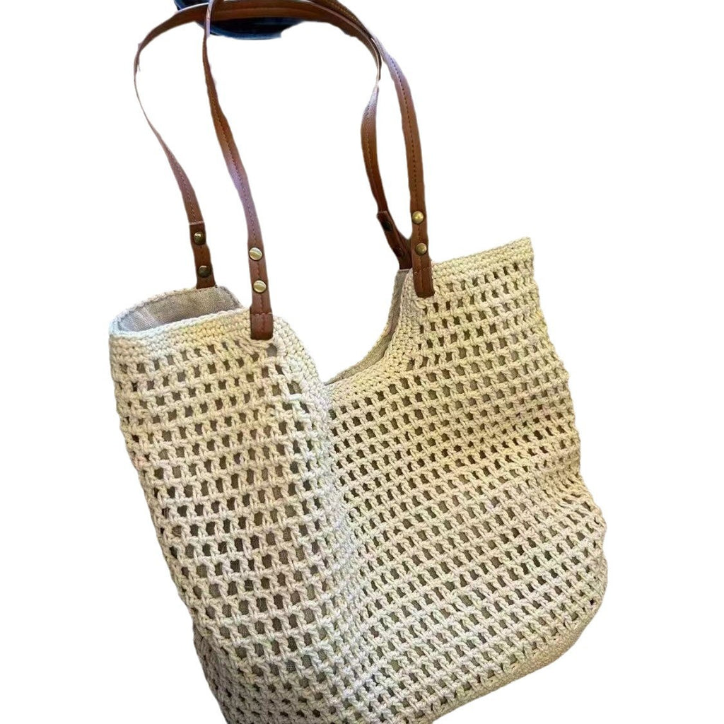 Grand ou petit sac féminin en coton tressé, au style élégant et en filet, porté à l’épaule.